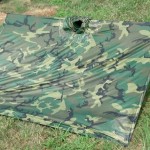 Pup tent style poncho shelter